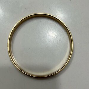 MONET vintage gold tone bangle bracelet. Solid. Exc condition. Beautiful sparkle